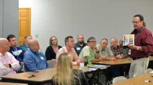 NPC's Tom Urbain explains CMYK process to Blair County Chamber of Commerce Farm-City group members