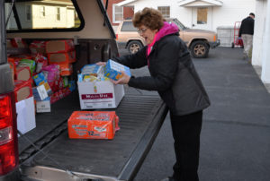 A volunteer from The Claysburg Food Bank